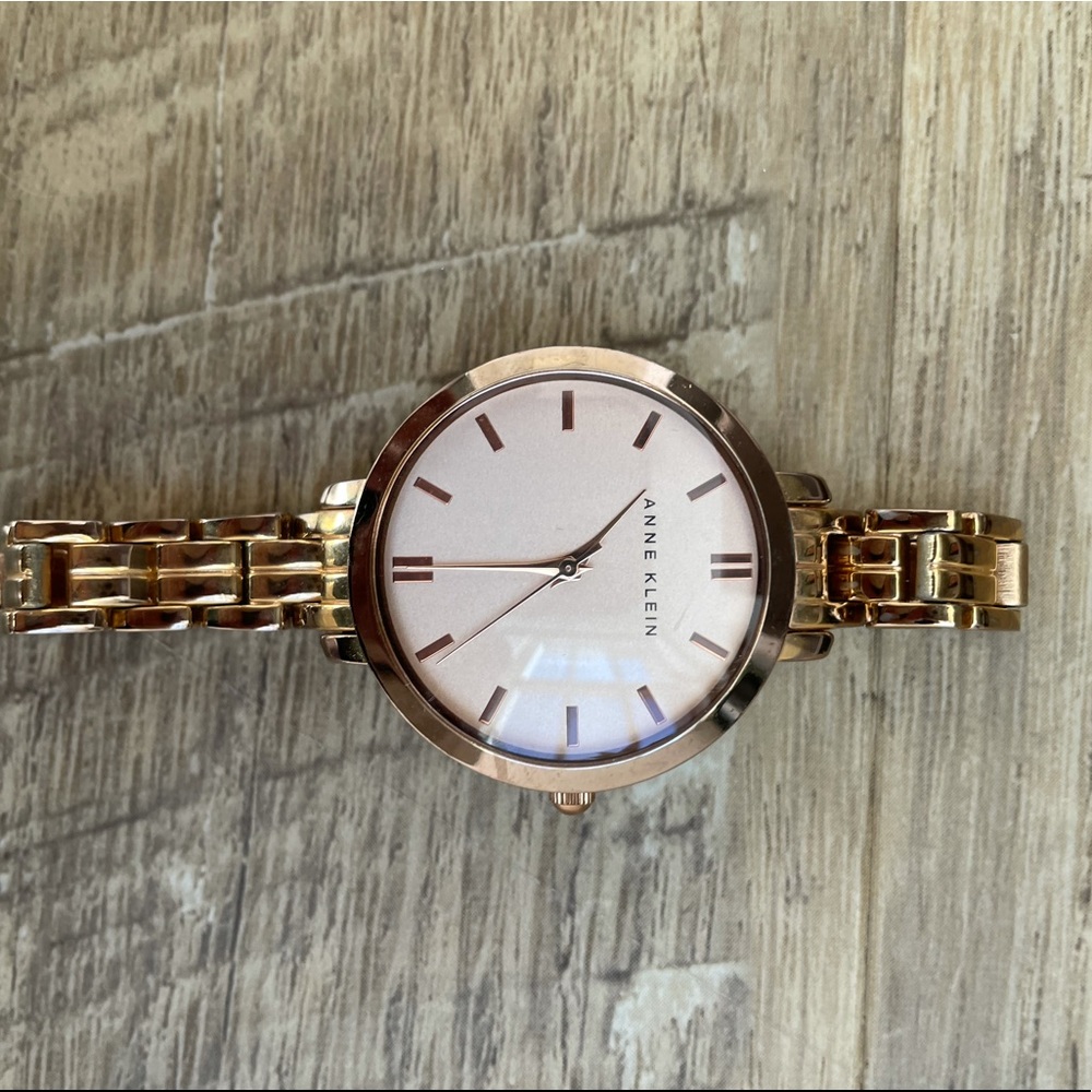Anne Klein gold watch, pink face